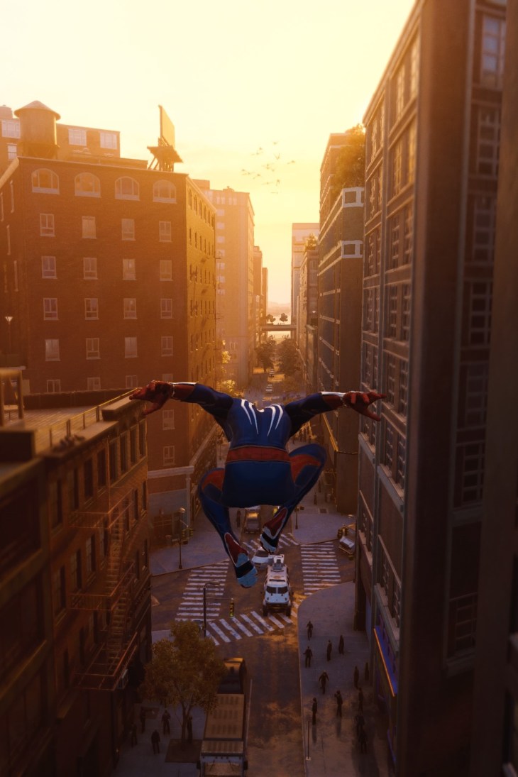 In-game graphics of Spider-Man travelling through the city streets.